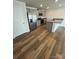 Kitchen featuring stainless steel appliances, granite countertops, and gray cabinets at 4116 Lurelin Ln, Charlotte, NC 28262