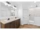 Bathroom featuring double vanity, tile flooring, and separate shower room at 447 Lookout Dam Rd, Statesville, NC 28625