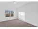 Cozy bedroom with carpet flooring, natural light, and neutral color scheme at 447 Lookout Dam Rd, Statesville, NC 28625