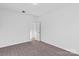 Spacious bedroom with plush carpet, natural light, and a closet at 447 Lookout Dam Rd, Statesville, NC 28625
