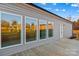 Home exterior featuring light gray siding, white trim, and a wooden deck at 447 Lookout Dam Rd, Statesville, NC 28625