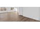 Bright and airy living room with hardwood floors and fresh white paint at 447 Lookout Dam Rd, Statesville, NC 28625