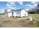 Rear exterior of home showcases well-maintained siding, foundation, and access to back of property at 565 Dunns Mountain Church Rd, Salisbury, NC 28146