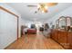 Large main bedroom with a fireplace, hardwood floors, and ample closet space at 565 Dunns Mountain Church Rd, Salisbury, NC 28146