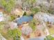 Aerial view of a house with mature trees on a large lot in a quiet neighborhood at 630 Windsor Ne Pl, Concord, NC 28025