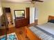 Cozy bedroom with hardwood floors, ensuite bathroom and a well-sized closet at 7107 Wilson Grove Rd, Mint Hill, NC 28227