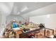 Finished bonus room, perfect for a playroom, office, or hobby area with ample storage and natural light at 786 Platinum Dr, Fort Mill, SC 29708