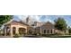 Stunning clubhouse exterior showcasing elegant architecture, lush landscaping, and convenient parking at 786 Platinum Dr, Fort Mill, SC 29708