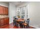 Bright dining area with a bay window, hardwood floors, and a chandelier, perfect for Gathering meals and gatherings at 786 Platinum Dr, Fort Mill, SC 29708