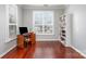 Cozy home office with wooden desk, chair, and view of the neighborhood at 786 Platinum Dr, Fort Mill, SC 29708