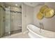Bright main bathroom with walk-in shower and soaking tub at 830 Jefferson Dr, Charlotte, NC 28270