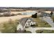 Expansive property next to the golf course featuring a well-maintained lawn and inviting curb appeal at 103 Caddies Ct, Shelby, NC 28150