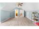 Bedroom featuring neutral walls and carpet, and access to the bathroom and staircase at 103 Caddies Ct, Shelby, NC 28150