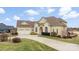 Beautiful home with a three-car garage, landscaped yard, and picturesque views at 103 Caddies Ct, Shelby, NC 28150
