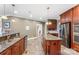 Well-appointed kitchen featuring granite countertops, stainless steel appliances, a center island, and custom cabinetry at 103 Caddies Ct, Shelby, NC 28150