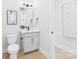 Bathroom featuring toilet, vanity with sink, and mirror at 1030 Rolling Meadows Dr # Rm13, Mooresville, NC 28115