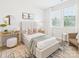 Comfortable bedroom featuring a cozy bed, accent chair, and soft natural light at 1030 Rolling Meadows Dr # Rm13, Mooresville, NC 28115