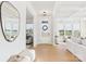 Bright foyer with a glass-paneled front door, modern lighting, and access to the open-concept living area at 1030 Rolling Meadows Dr # Rm13, Mooresville, NC 28115