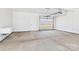 Spacious garage with sink and translucent garage door at 1030 Rolling Meadows Dr # Rm13, Mooresville, NC 28115