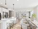 Bright kitchen with a large island, barstool seating, and open view to the living and dining areas at 1030 Rolling Meadows Dr # Rm13, Mooresville, NC 28115