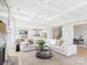 Spacious living room with coffered ceilings, fireplace, open to the kitchen and dining areas at 1030 Rolling Meadows Dr # Rm13, Mooresville, NC 28115