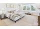 Bright and spacious main bedroom featuring a cozy sitting area and a large window with natural light at 1030 Rolling Meadows Dr # Rm13, Mooresville, NC 28115