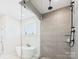 Modern bathroom featuring a glass enclosed shower with black fixtures and grey tile at 1030 Rolling Meadows Dr # Rm13, Mooresville, NC 28115