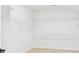 Walk-in closet with white walls, wire shelving, and hardwood floors at 1030 Rolling Meadows Dr # Rm13, Mooresville, NC 28115