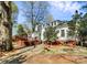 The deck in the backyard has an outdoor living space, and access to the private backyard at 1101 Lancaster Ave, Monroe, NC 28112