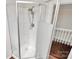 Modern bathroom shower with silver fixtures and a glass door at 1101 Lancaster Ave, Monroe, NC 28112