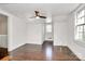 Bedroom features wood floor and ample natural light from a large window at 1101 Lancaster Ave, Monroe, NC 28112