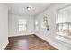 Inviting entryway features wood floors and a door with glass panels at 1101 Lancaster Ave, Monroe, NC 28112