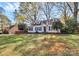 Charming single Gathering home with a large front lawn at 1101 Lancaster Ave, Monroe, NC 28112