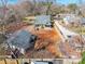 Aerial view of a home surrounded by bare trees, showing the roof and backyard at 112 Lentz St, Rockwell, NC 28138