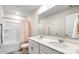 Bathroom with shower and bathtub combination with dual sink vanity at 121 Edgehill Ct, Troutman, NC 28166