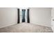 Bedroom featuring carpet flooring and natural light at 121 Edgehill Ct, Troutman, NC 28166