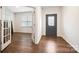 Bright entryway features hardwood floors, a front door with decorative glass, and a glass french door to another room at 121 Edgehill Ct, Troutman, NC 28166
