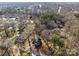 Overhead view capturing homes surrounded by trees and streets, with a mix of residences and a cozy neighborhood layout at 1216 Innis Ave, Kannapolis, NC 28081