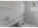 Bathroom with white tile, beadboard, and classic fixtures at 1216 Innis Ave, Kannapolis, NC 28081