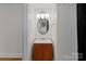 Bathroom with a round mirror at 1216 Innis Ave, Kannapolis, NC 28081
