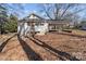 Quaint home featuring a covered carport and backyard access at 1216 Innis Ave, Kannapolis, NC 28081