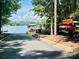 Neighborhood lake access point featuring boat ramp and kayak storage at 12702 Overlook Mountain Dr, Charlotte, NC 28216