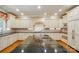 Spacious kitchen with a large island, granite countertops, and stainless steel appliances at 12702 Overlook Mountain Dr, Charlotte, NC 28216