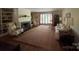Spacious living room with fireplace and built-in shelving at 13828 Lake Bluff Dr, Matthews, NC 28105