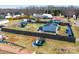 Large fenced backyard with multiple buildings including a gazebo and a shed at 1868 Ellick Dr, Newton, NC 28658