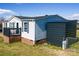 Side view of a home with siding and a metal shed in the backyard at 1868 Ellick Dr, Newton, NC 28658