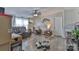 Relaxing living room featuring hardwood floors, reclining couches and updated lighting at 1868 Ellick Dr, Newton, NC 28658