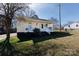 Charming home featuring a welcoming front porch and well-maintained lawn in a residential neighborhood at 206 Mcconnell St, Clover, SC 29710