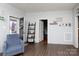 Bright living room featuring hardwood floors and an open layout, enhancing the sense of space at 206 Mcconnell St, Clover, SC 29710