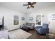 Comfortable living room with natural light and a cozy seating arrangement, ideal for Gathering gatherings at 206 Mcconnell St, Clover, SC 29710